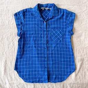 Blue button up women’s top.